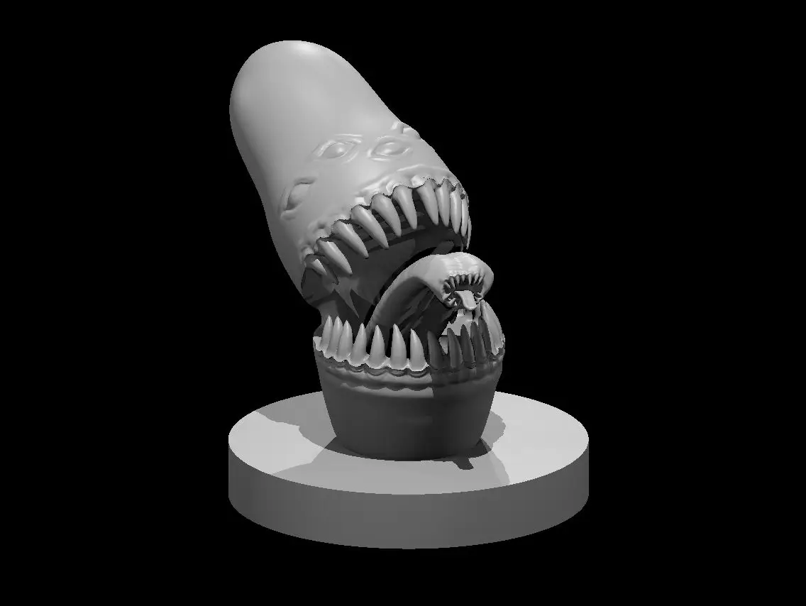 Resin 3D printed miniature of a nesting doll mimic.