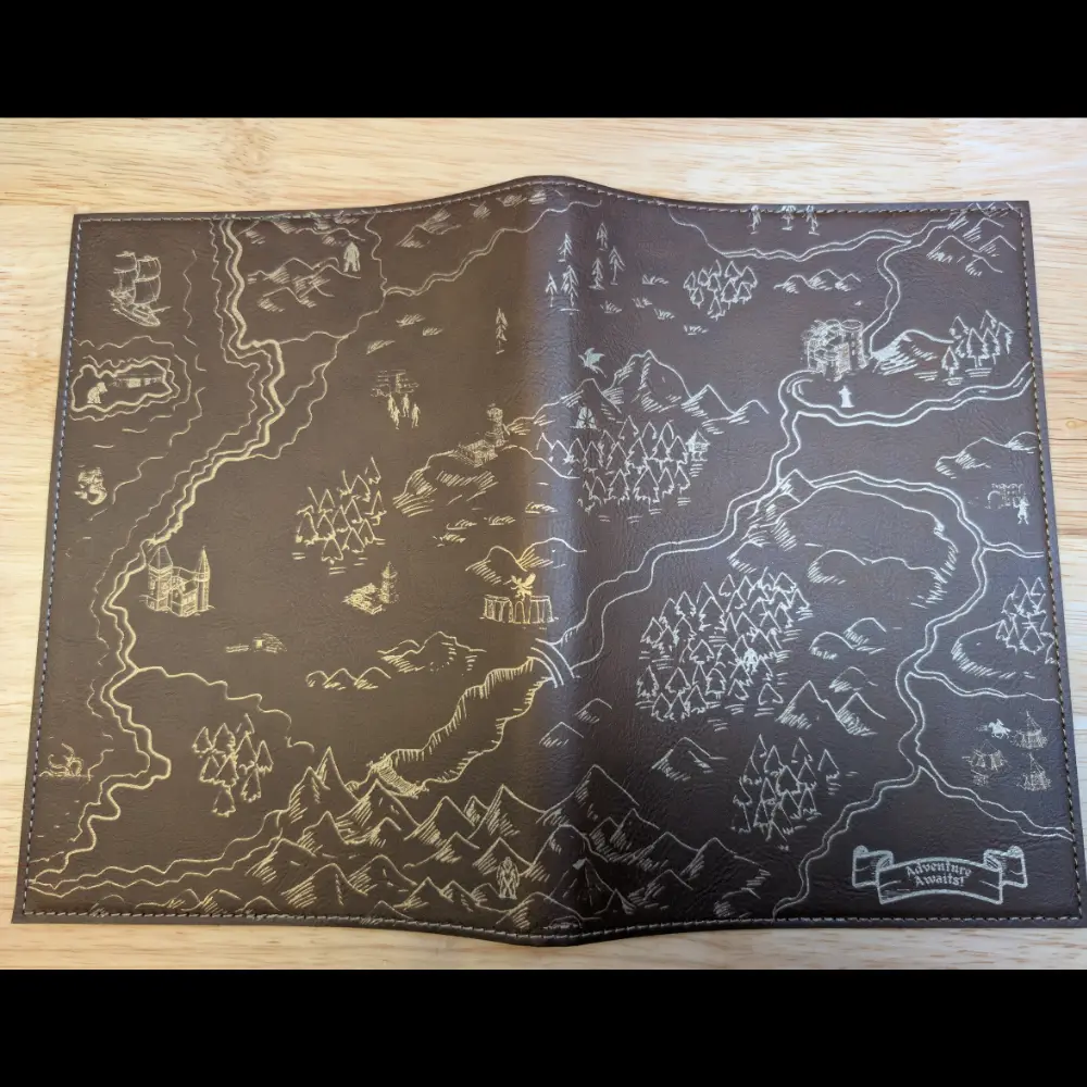 Full view of laser engraved fantasy map that spans both the front and back covers.